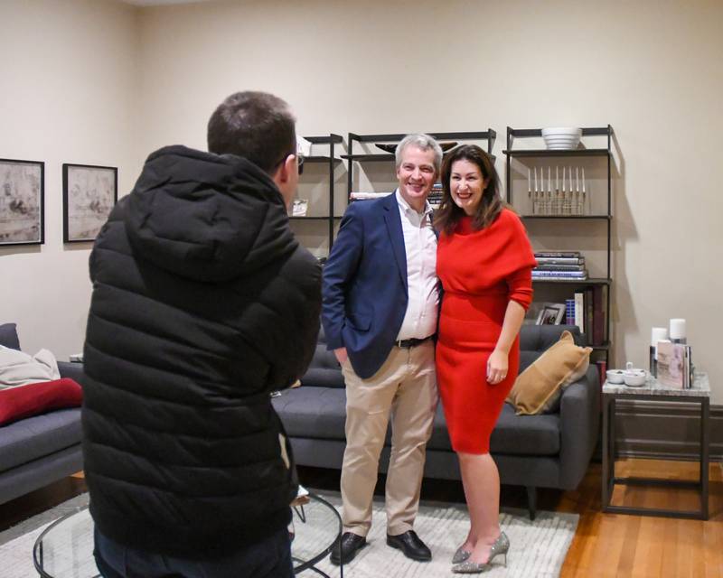 The Henderson’s Mike and Lisa pose for a photo during the Holiday Sip and Sweet Tour event in La Grange held on Sunday Dec. 17, 2023.