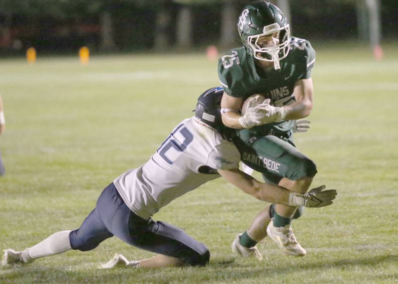 St. Bede's Brennen Hirst scores a touchdown as Bureau Valley's Brandon Carrington misses the tackle on Friday Aug. 29, 2025 at St. Bede Academy.