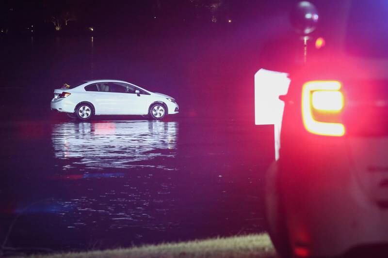 A woman was rescued Thursday, Dec. 29, 2022, after she drove her car out onto the frozen lake in Lakewood, police said in a news release on Saturday.