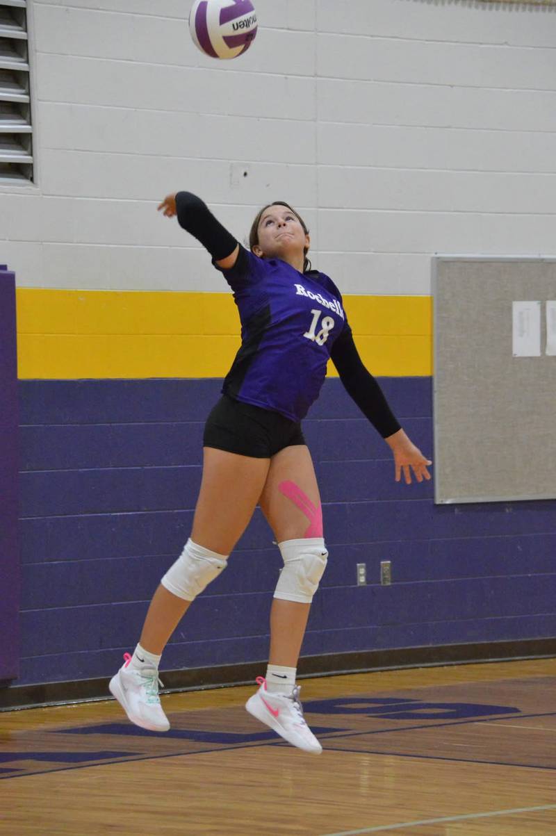 Rochelle's Tinlea Sitter serves the ball during an eighth-grade volleyball match with Burlington Central on Sept. 8
