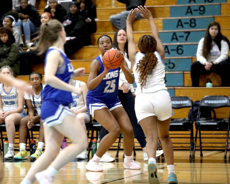 Lyons Township's Nora Ezike goes for three points during the West Suburban Conference championship game against Downers Grove South on Thursday, Feb. 13, 2025 at Willowbrook High School.