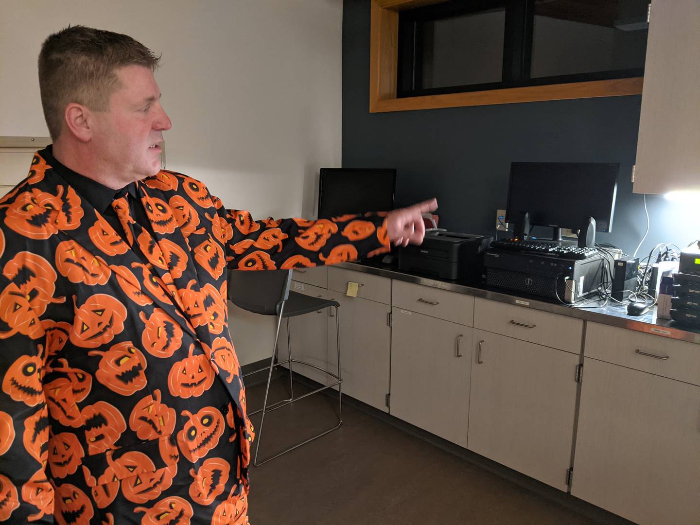 Sandwich Police Chief Kevin Senne points out aspects of an evidence processing room as part of a tour of the new Sandwich Police Department’s Public Safety Center during an open house on Oct. 25.