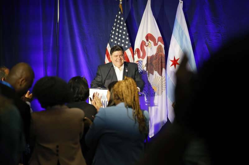 Illinois Gov. JB Pritzker on stage during the Illinois delegation breakfast Monday at the Royal Sonesta hotel in Chicago