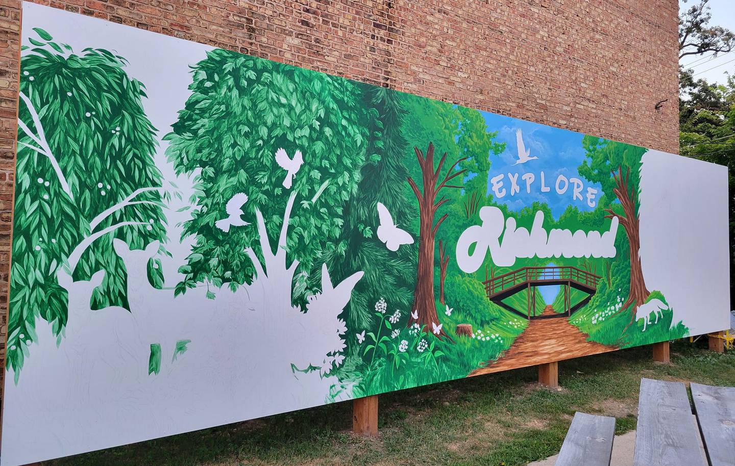Lexi Lesko, of Trevor, Wisconsin, painted Richmond's Main Street mural, which will be completed in time for a ribbon cutting set for 5 p.m. Saturday as part of the village's Fall Fest.