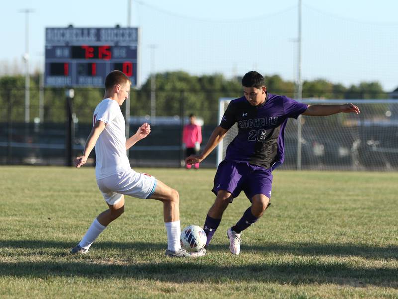 Rochelle's Jonathan Sanchez Ponce (26) fights for possession of the ball during a game with La Salle-Peru on Oct. 9, 2025.