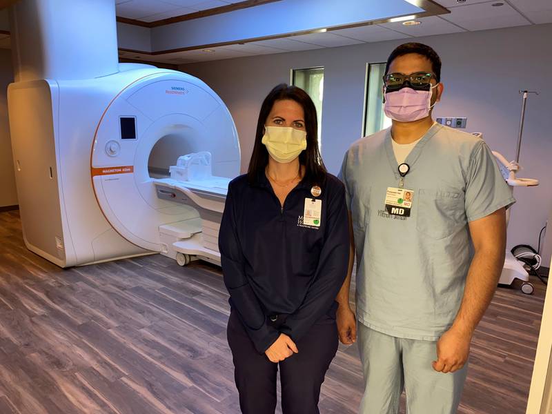 Morris Hospital's new Magnetom Altea 1.5T MRI system from Siemens Healthineers delivers clear images in shorter time with greater patient comfort. Pictured are Amanda Warren, an MRI technologist at Morris Hospital, and Dr. Furquaan Isa, radiologist.