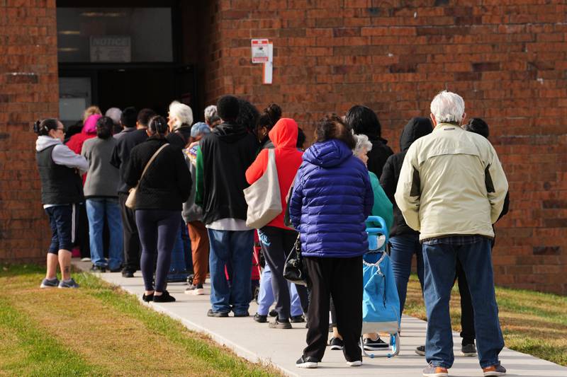 People wait in line during an emergency food distribution at The Jewish Federation of Greater Philadelphia's Mitzvah Food Program in Philadelphia, Friday, Nov. 7, 2025. (AP Photo/Matt Rourke)