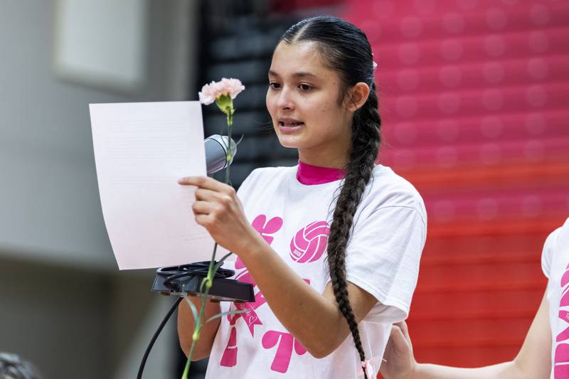 Bolingbrook's Moranda Francisco shares remarks about the team’s Pink Out in honor of her mother, Brandy Francisco, prior to the varsity volleyball home game against Joliet West on Oct. 16, 2025.