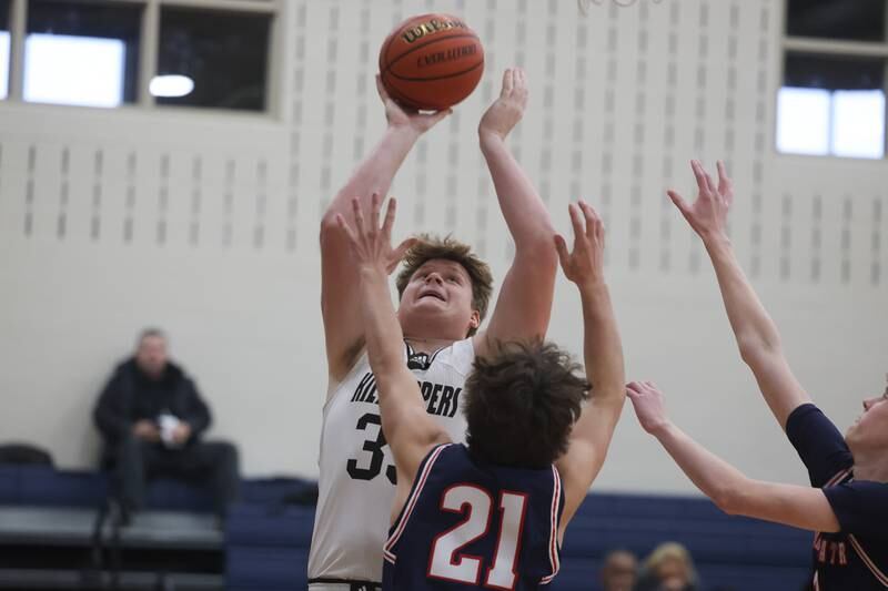 Joliet Catholic’s Anthony Birsa puts up a shot against St. Viator.