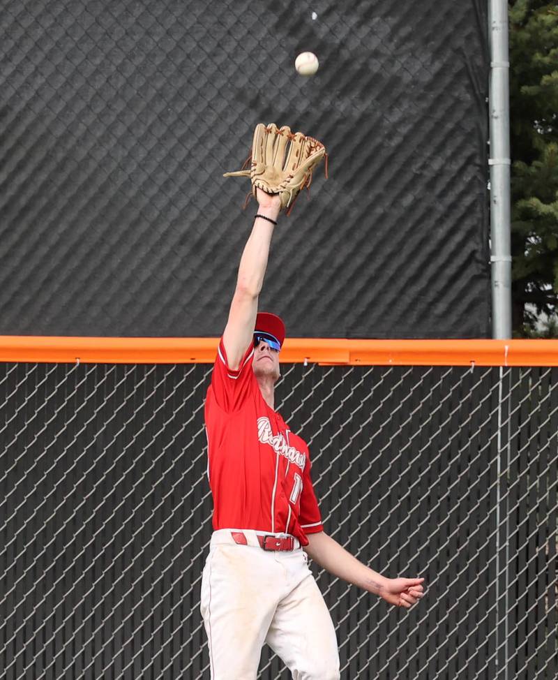Naperville Central's Collin Hay makes a play in center field Monday, April 28, 2025, during their game at DeKalb High School.