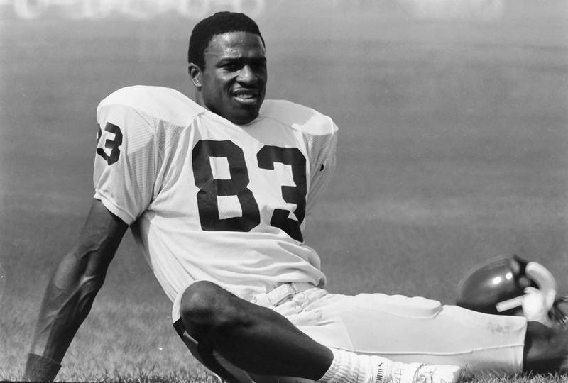 Chicago Bears wide receiver Willie Gault stretches during training camp on Wednesday, June 12, 1985 in Platteville Wis.