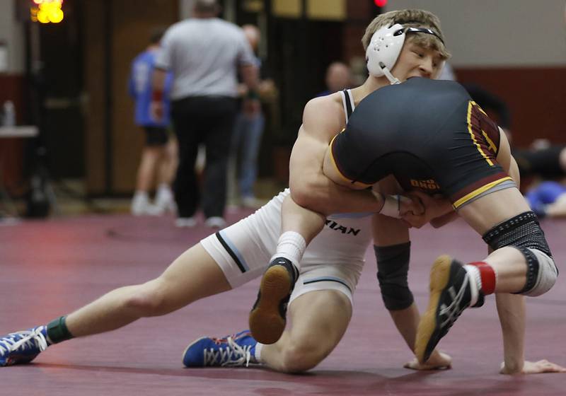Marian Central’s Brayden Teunissen  tries to control Richmond-Burton’s Adam Glauser in the 120-pound championship match of the IHSA 1A Marengo Wrestling Regional on Saturday, Feb. 8, 2025, at Marengo High School.