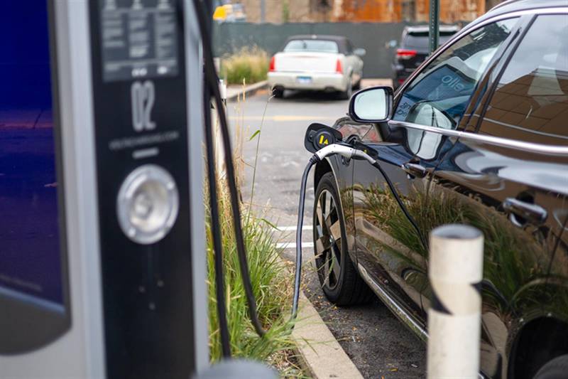 An electric vehicle is pictured charging in Chicago.