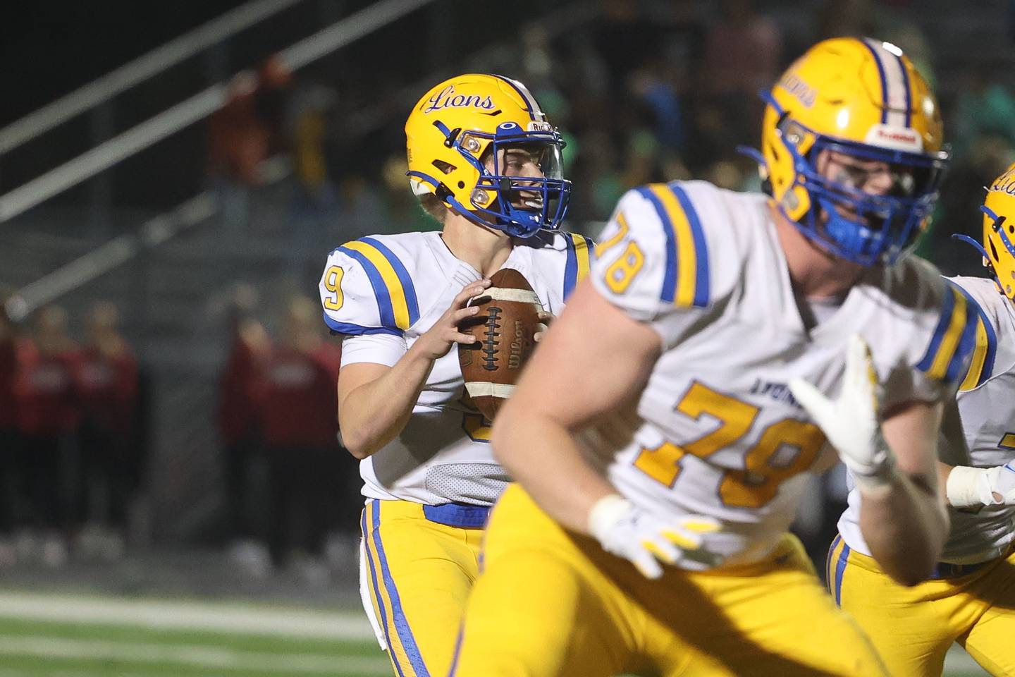 Lyons’ Ryan Jackson looks to pass against Plainfield North in round two of the Class 8A playoffs on Friday