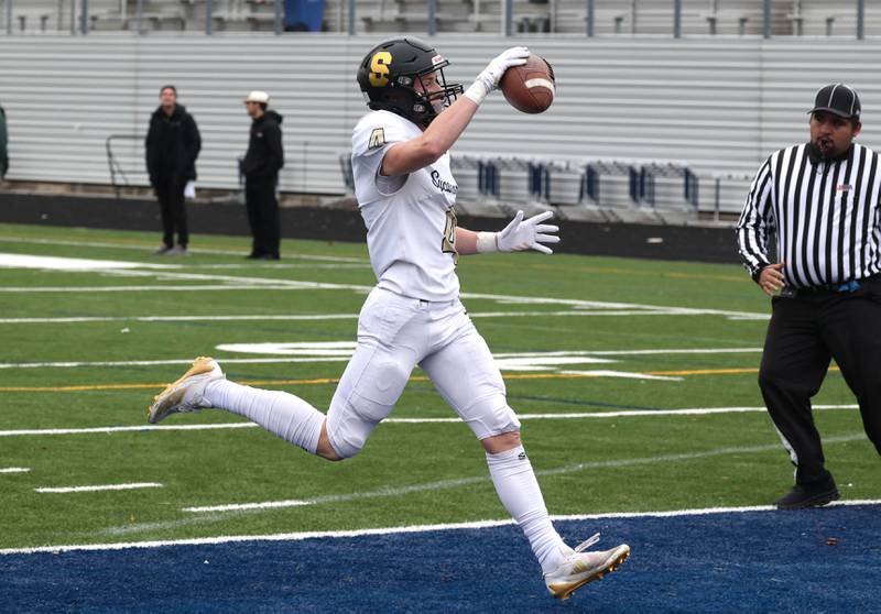 Sycamore's Aidan Wyzard scores a touchdown Saturday, Nov. 9, 2024 during their Class 5A second-round playoff game against Westinghouse at Knute Rockne Stadium in Chicago.