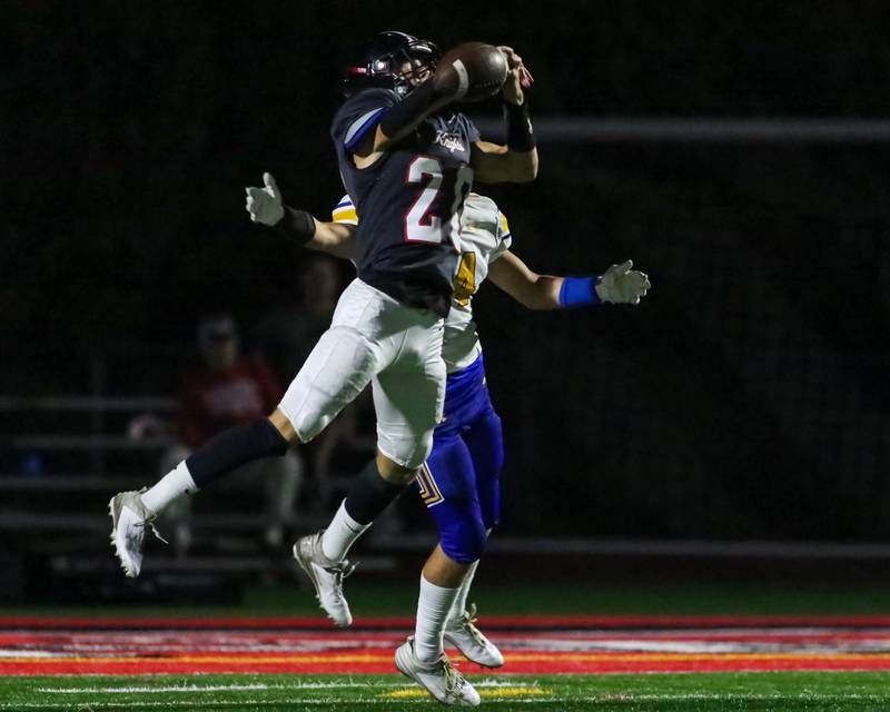 Lincoln Way Central's Ben Rafferty (20) breaks up a pass intended for Sandburg's Jeffrey Bellik (14) during football game between Sandburg at Lincoln Way Central.  Sept 22, 2023.