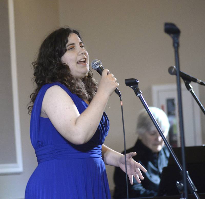 Corrine Francis, a senior at Ottawa High School, sings during a vocal performance Friday, Nov. 11, 2022, before receiving recognition at the Grand Bear Lodge in Utica during the NCI ARTworks Mad Hatter’s Ball.