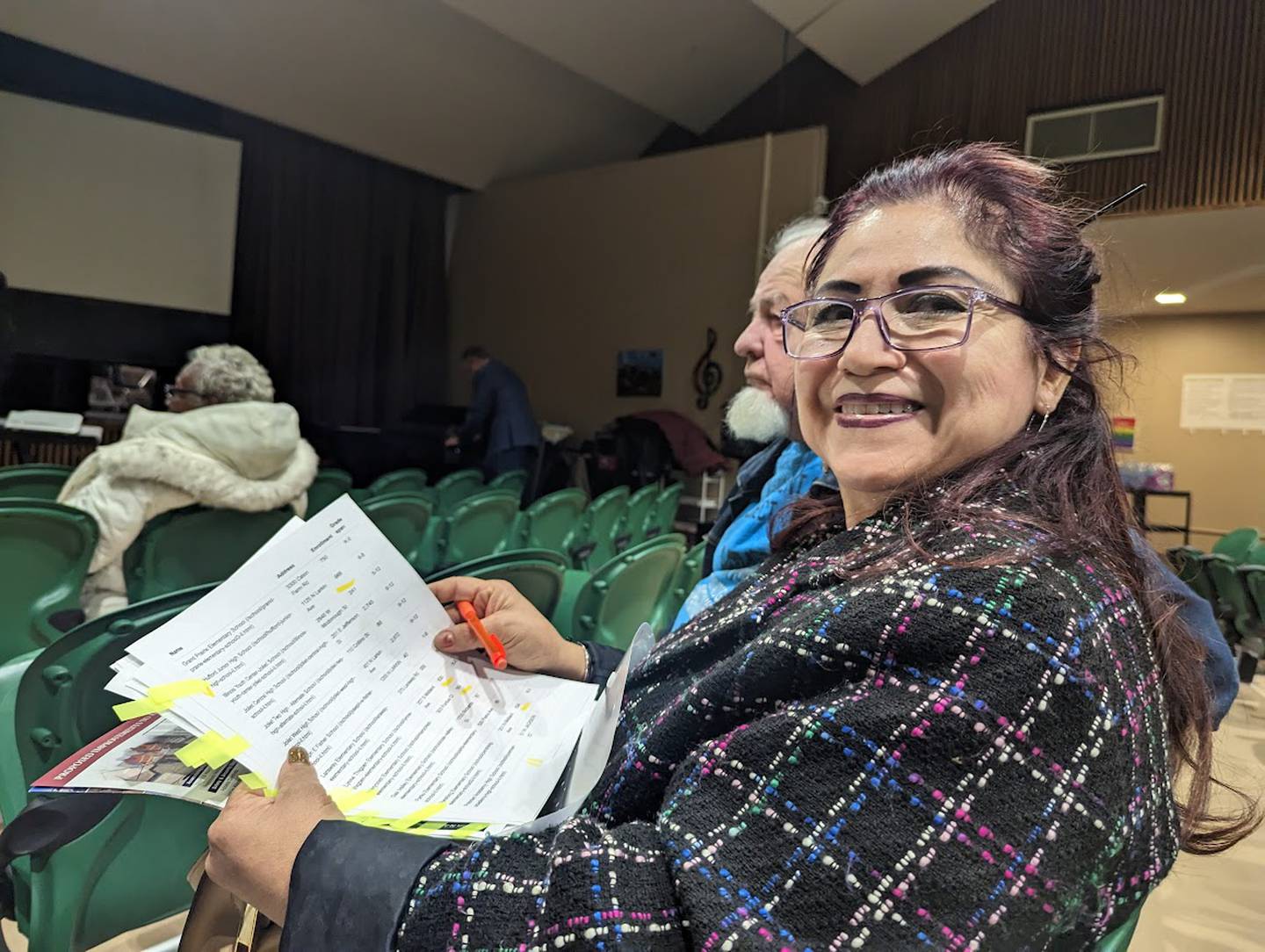Maria A. Rosas Urbano of Joliet came to the first of two informational meetings with a thick packet of information on District 86 she'd printed from the internet. Urbano wanted to know why District 86 was rushing with putting the referendum on the ballot and why all 21 schools in the district weren't receiving the same attention. The informational meeting was held Monday, Dec. 12, 2022, at Gompers Junior High School in Joliet.