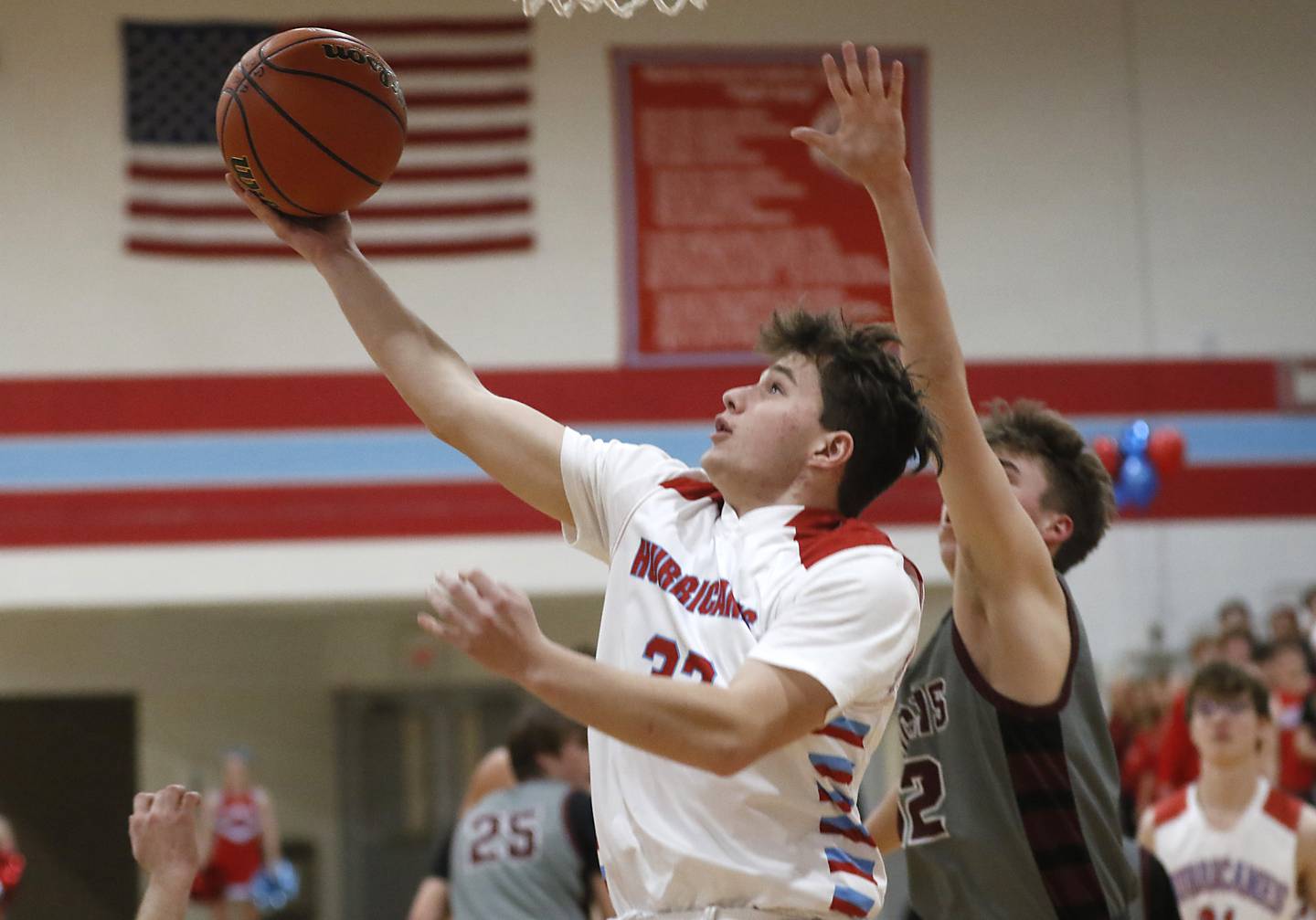 Marian Central's Logan Brandt drives to the basket against Marengo's Anthony Muscolino during a nononference boys basketball game Tuesday, Feb.13, 2024, at Marian Central High School.