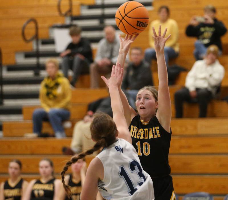 Riverdale's Molly Skahill shoots a jump shot over Bureau Valley's Libby Endress during the Thanksgiving Tournament on Wednesday, Nov. 20, 2024 at Bureau Valley High School.