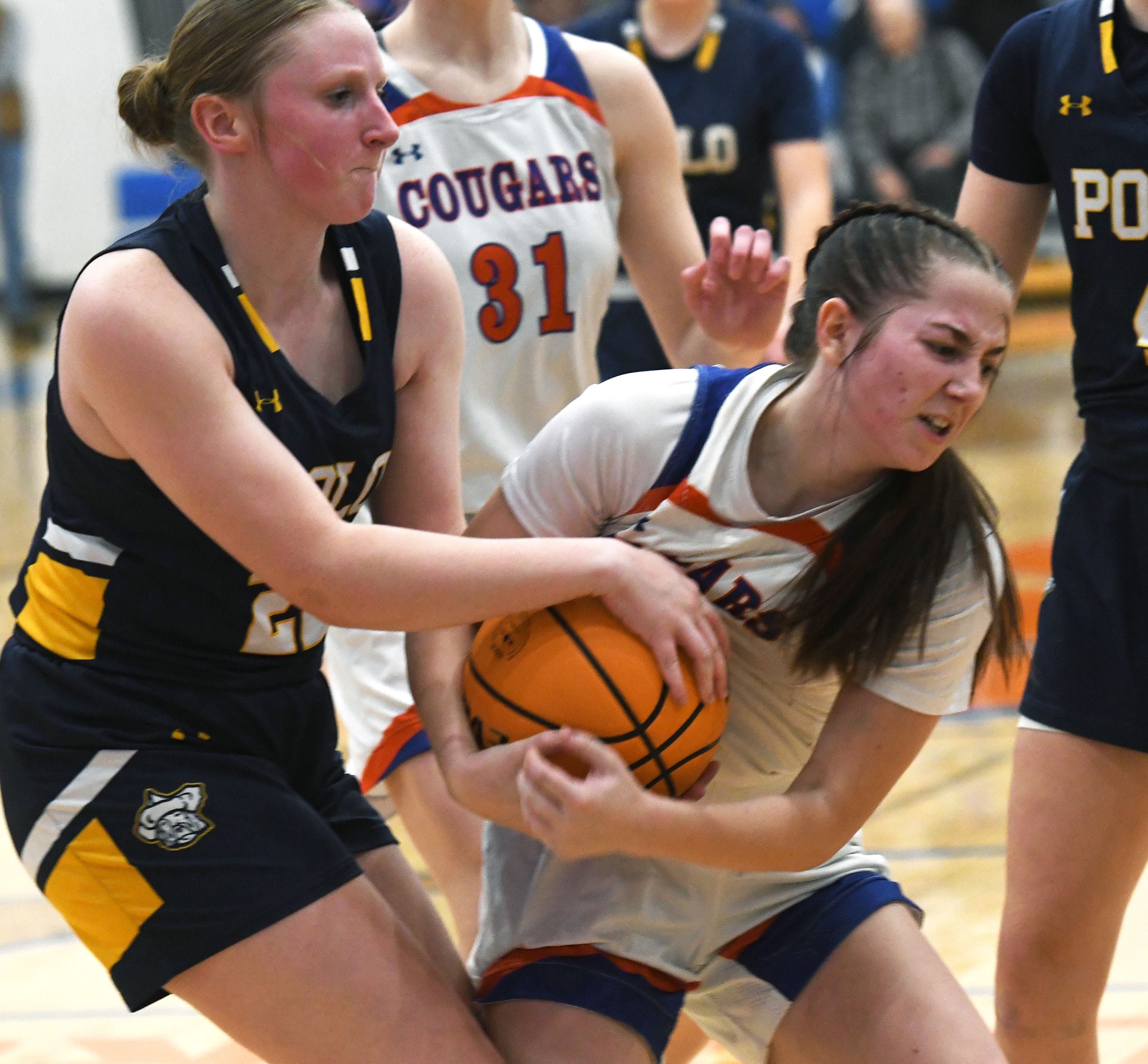 Polo's Avalyn Henry (left) and Eastland's Sienna Peterson fight for the ball during on Tuesday, Feb. 10, 2026 at Eastland High School in Lanark.