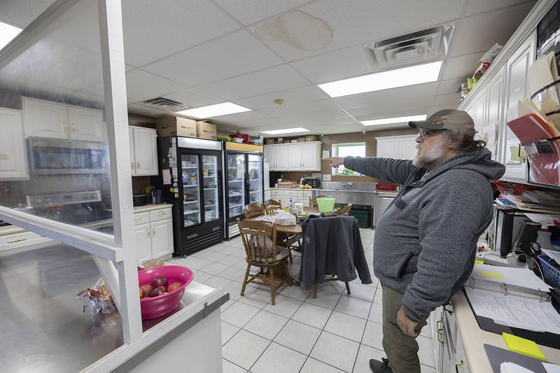 Twin Cities PADS Director Myles Newberry gestures towards improvements made at the shelter Thursday, Dec. 5, 2024, through federal CARES Act money. Sterling’s recent ordinance to public camping doesn’t really affect those who stay at the shelter, Newberry said.