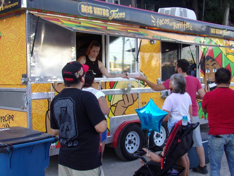 Dos Vatos Tacos was just one of a handful of food vendors serving people at the Rock the River celebration Sunday, July 3, 2022, along Water Street in Peru.