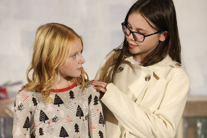 Rose Tracey as Hannah Bloom and Lizzie Trotter as Mrs. Bloom, act out a scene during a rehearsal of “The Magic of Christmas” the Children’s Christmas Musical on Tuesday, Nov. 11, 2025 at the Prairie Art’s Center in Princeton.