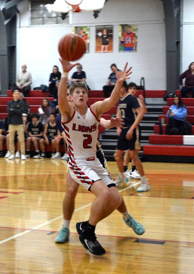 LaMoille's Brayden Klein against Hiawatha Wednesday night at Dean Madsen Gymnasium. The Lions won 62-54.