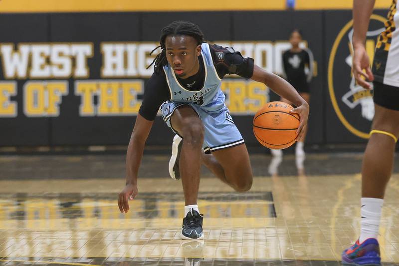 Kankakee’s Cedric Terrell III looks to make a play against Joliet West on Wednesday, Feb. 18, 2026 in Joliet.