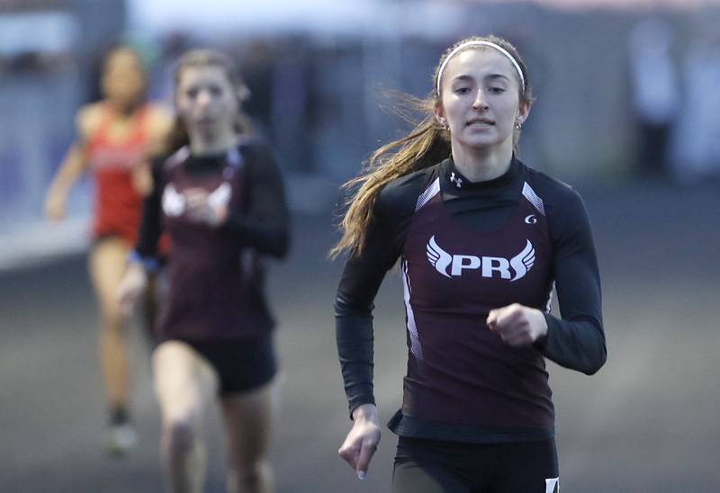 Prairie Ridge’s Rylee Lydon runs to the finish line in the 400 meter dash during Fox Valley Conference girls track and field meet Friday, May 6, 2022, at Hampshire High School.