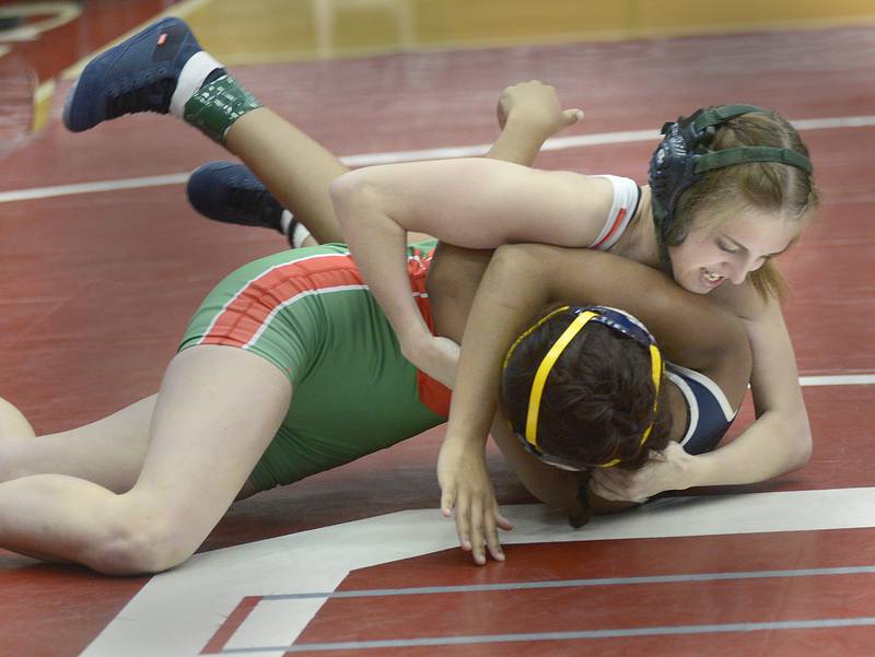 La Salle-Peru's Sarah Lowery looks to pin Sterling's Jenavieve Echols in a 110-pound bout at Monday's Ottawa Holiday Hootenanny Invite in Kingman Gymnasium.