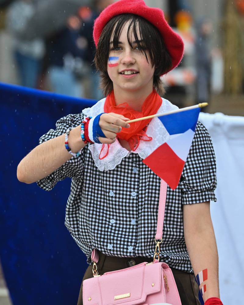 A member of the Crystal Lake Central H.S. French Club seen during the school's 100 year anniversary homecoming day parade on Saturday, Sep. 16, 2023 in Crystal Lake. The parade began at the high school and made its way through downtown Crystal Lake.