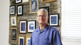 Erie photographer shines a light on business