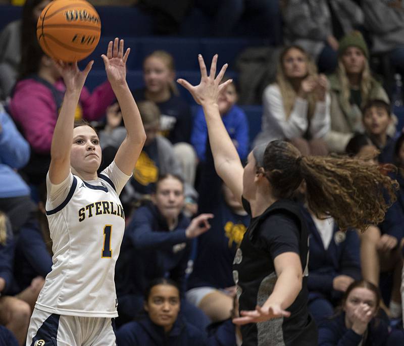 Sterling’s Brenley Johnson puts up a three point shot against Galesburg Thursday, Dec. 4, 2025.