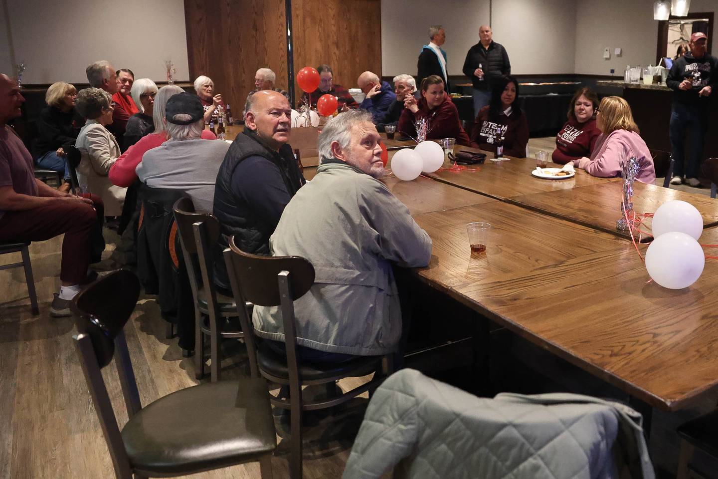Referendum committee members and supporters gather for the Lockport Township High School District 205 watch party at Coom’s Corner on Tuesday, March 19 in Lockport.