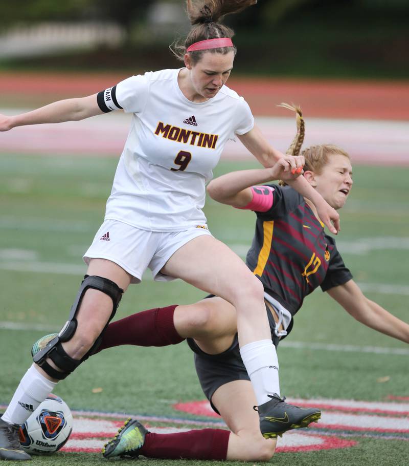 Montini's Maren Hoovel and Richmond-Burton's Madison Havlicek collide at the ball Friday, May 27, 2022, during their IHSA Class 1A state semifinal game at North Central College in Naperville.
