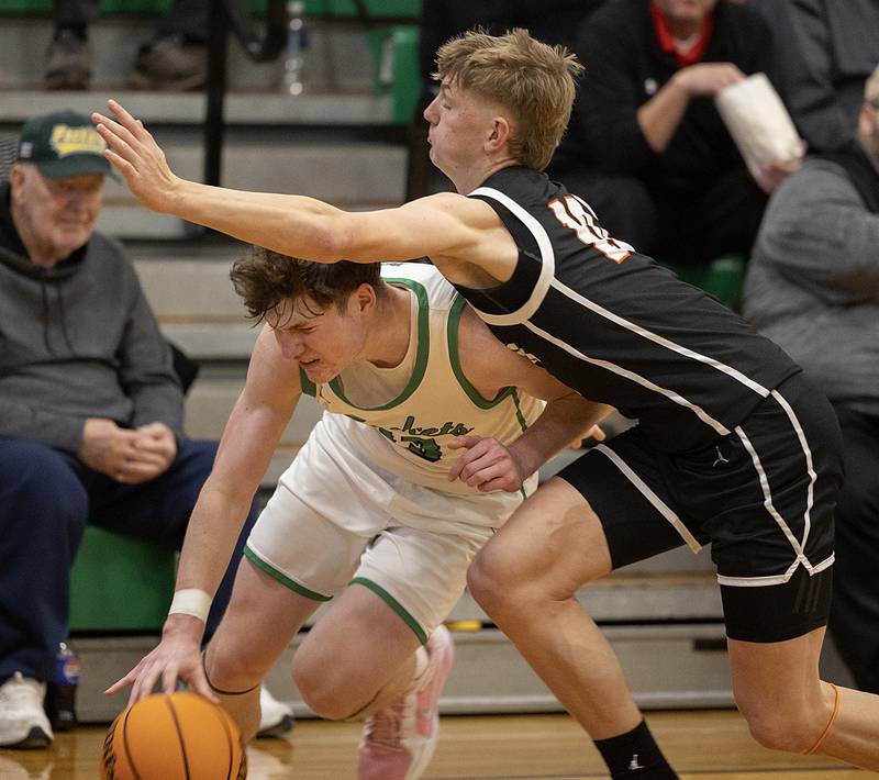 Rock Falls’ Ryken Howard drives against Byron’s Weston Auker Thursday, Dec. 5, 2024, at Rock Falls High School.