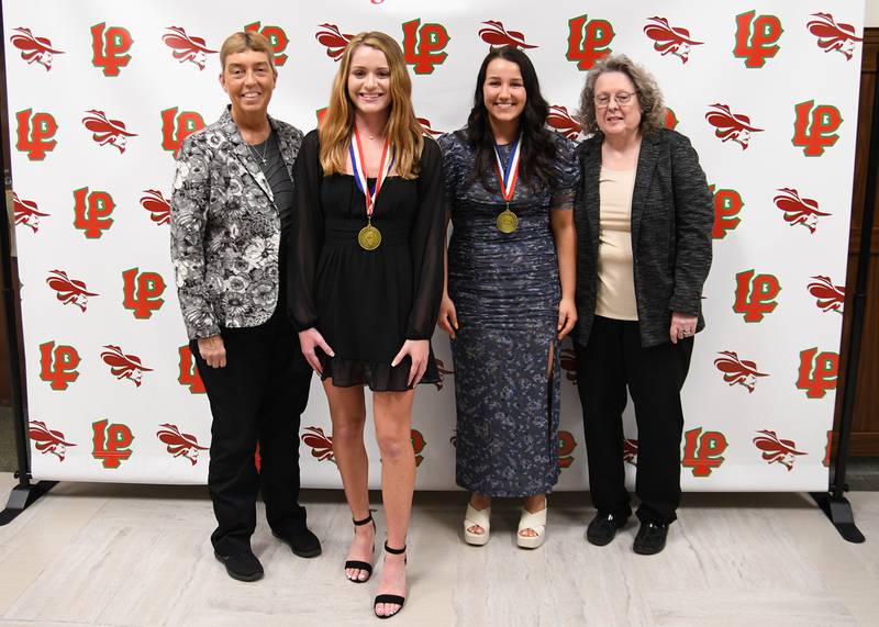 Carlie Miller (middle left) and Autumn Bunzell (middle right) received the 2023 Illinois Science Teachers Biology Award at La Salle-Peru High School.