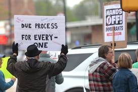 Oregon May Day rally protest: Attendees display signs against Trump policies