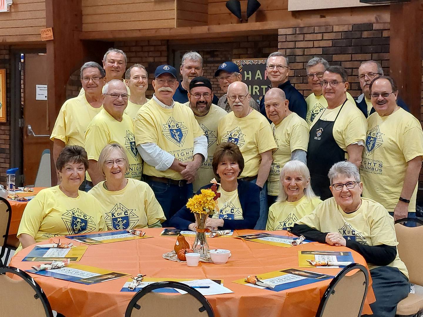 Volunteers from the Knights and Lady Knights of Columbus celebrate another successful Thanksgiving Luncheon at the Beecher Center in 2023.