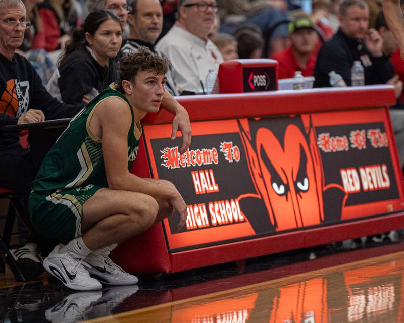 Gino Ferrari (4) of St. Bede crouches next to scorer's table awaiting substitution on Saturday, January 31, 2026 at Hall High School in Spring Valley.