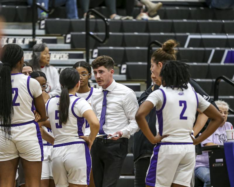 Plano's head coach Tristan Spivey talks to the team during their basketball game between Johnsburg at Plano, Monday Dec 16, 2024 in Plano.