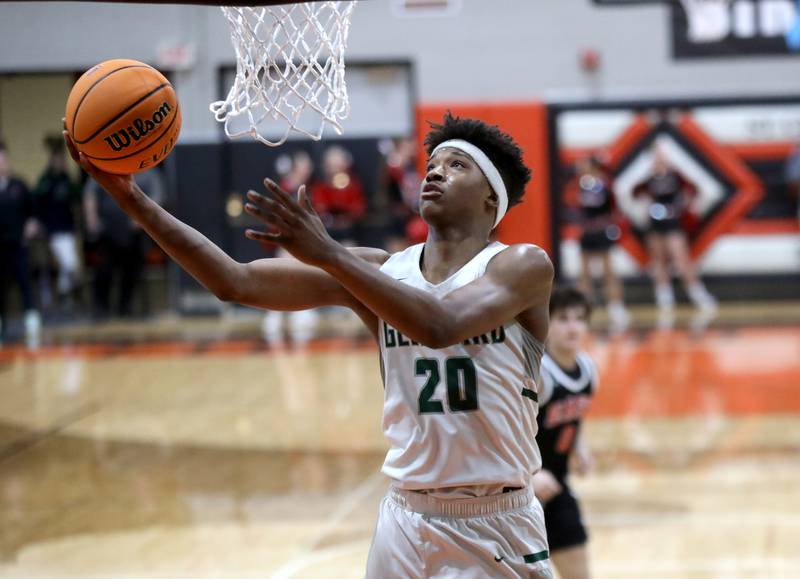 Glenbard West's Logan Glover gets the ball to the basket during a Class 4A St. Charles East Sectional semifinal against Glenbard East on Tuesday, March 4, 2025 in St. Charles.