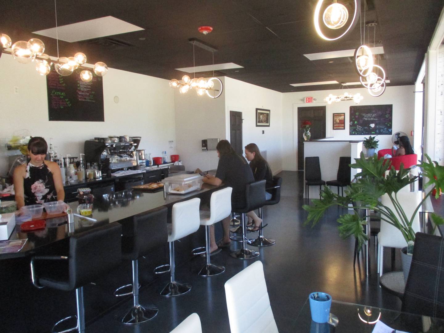 Iconic Coffee Shop in downtown Yorkville features plenty of seating for customers.