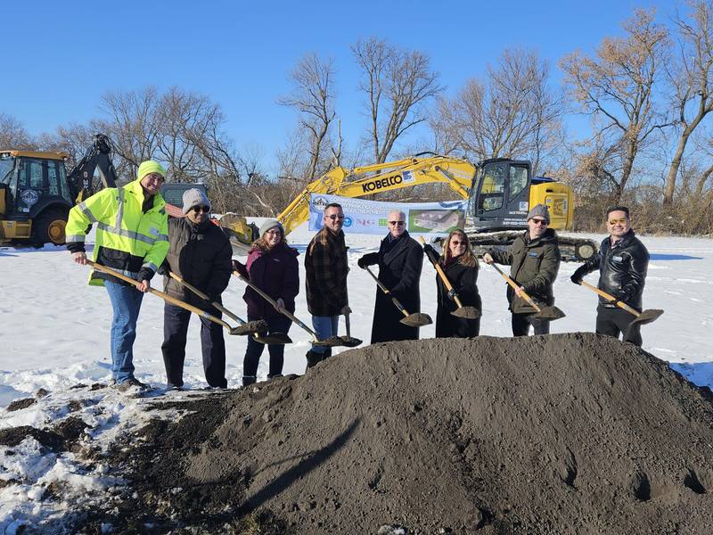 From left to right: Joshua Schmitt, Ravi Jayaraman, Sylwia Kokoszka, Kevin Aronson, Mayor Mark Kownick, Trustee Ellen McAlpine, Trustee David Prusina and Village Administrator Erik Morimoto celebrate the groundbreaking of a new well and water treatment facility on Dec. 4, 2025 in Cary.