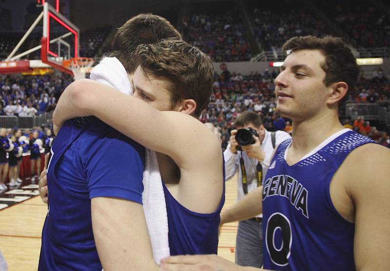 Geneva seniors Nate Navigato (left), Pace Temple (center) and Daniel Santacaterina console each other Saturday in Peoria. The Vikings dropped the IHSA Class 4A third-place game against Bolingbrook.