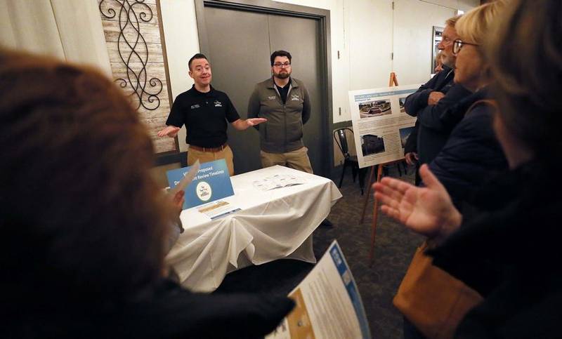 Carpentersville Senior Planner John Svalenka, left, and Village Manager Eric Johnson answer questions about the proposed warehouse development at Randall and Binnie roads during an open house Thursday, Nov. 17, 2022, at Randall Oaks Banquet Facility in West Dundee.