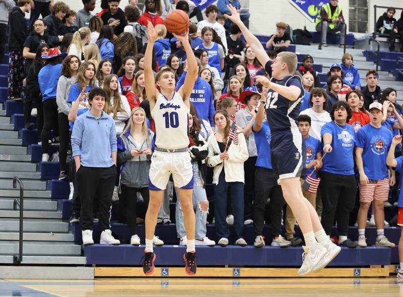 Riverside Brookfield's Arius Alijosius (10) takes a three-point shot during the boys varsity basketball game between IC Catholic Prep and Riverside Brookfield in Riverside on Tuesday, Jan. 24, 2023.