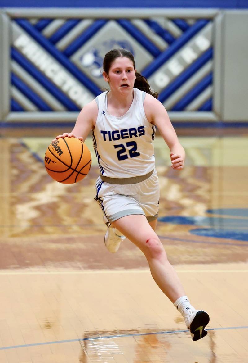 Princeton's Camryn Driscoll brings the ball up against Midland Thursday night at Prouty Gym. The Tigresses won 69-34 to improve to 3-0.